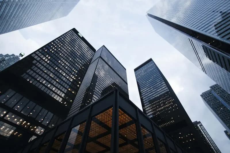 Modern institutional buildings representing Arx-Prima's rigorous standards